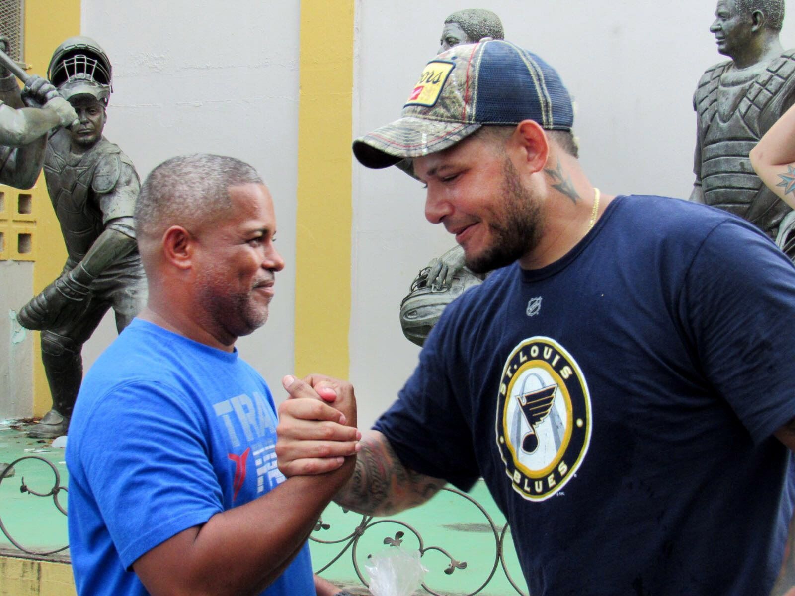 Molina greets neighbor in hometown Vega Alta, Puerto Rico